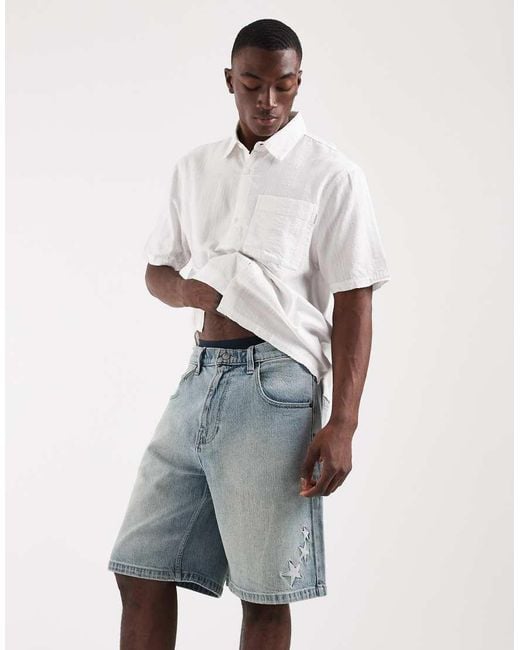 Hollister Natural baggy Denim Shorts With Star Embroidery Detail for men