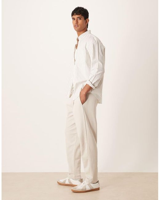 ASOS Natural Relaxed Tapered Trackies With Pleats for men