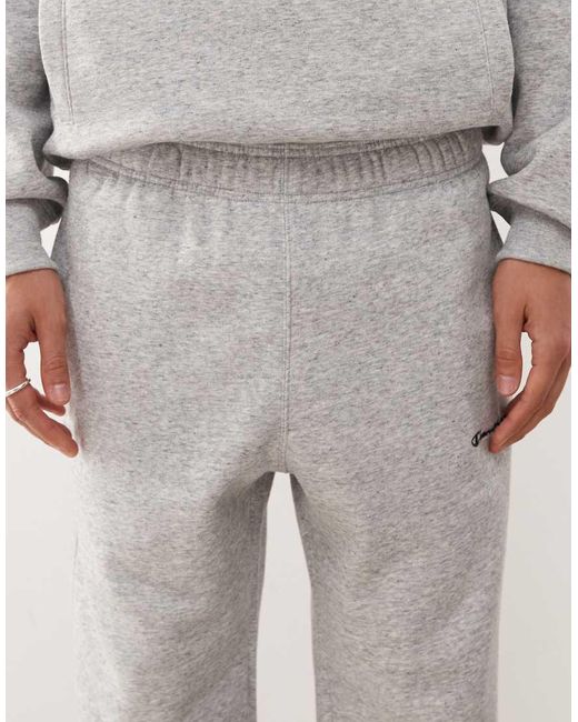 Joggers Grises Con Bajos Ajustados De Champion de hombre de color Gray