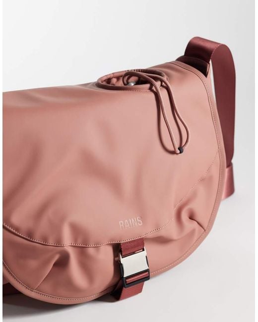 Rains Pink 16640 Waterproof Bottle Cross Body Bag