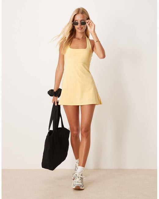 4505 Active Halter Neck Tennis Dress With Under Shorts in Yellow | Lyst