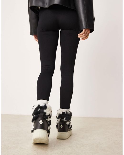 Gravita - après-ski fourrure à motif pied-de-poule Pajar en coloris Black