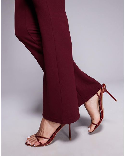 Pantalon d'ensemble ajusté puis évasé en jersey - bordeaux ASOS en coloris Red