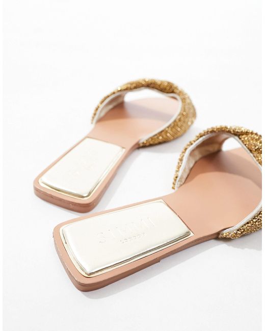Sandalias doradas planas con tira SIMMI de color Pink