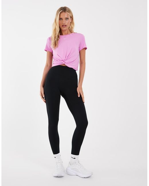 Leggings Con Estribo En Nike de color Pink