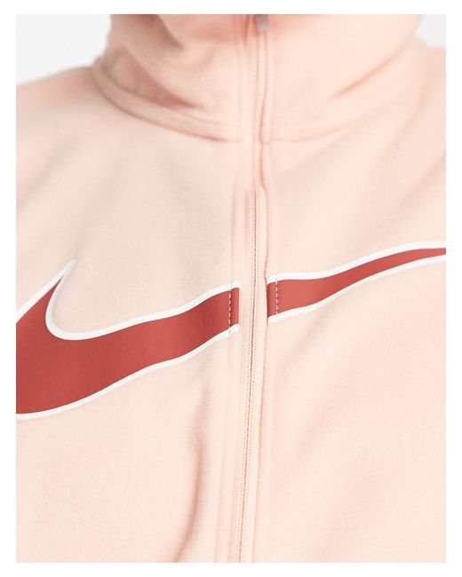 Nike Red – swoosh run dri-fit – laufjacke aus fleece mit logo und reißverschluss