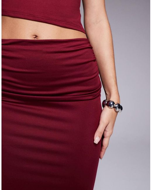 The Frolic Red Exclusive Double Sculpted Slinky Drape Ruched Front Detail Maxi Skirt