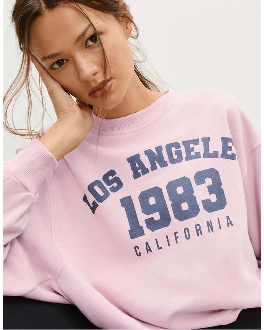 Stradivarius Sweatshirt Met Print En Pofmouwen in het Pink