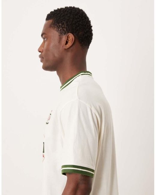 ASOS Natural Relaxed T-shirt With Neck And Cuff Tipping And Football Graphic for men