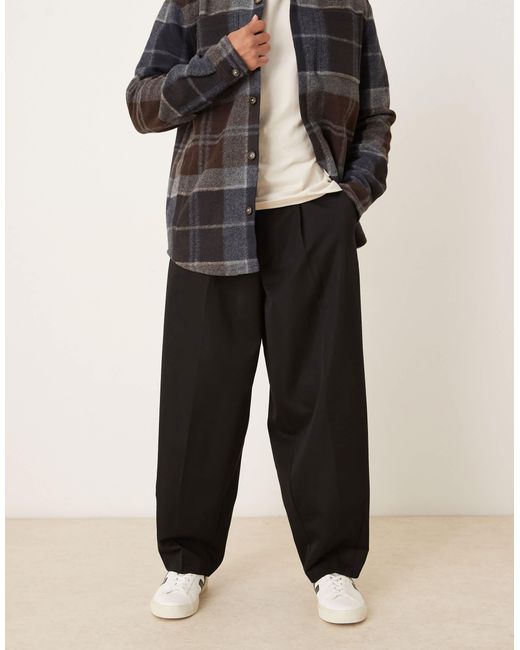 Pantalon ample et élégant à pinces ASOS pour homme en coloris Black