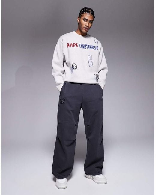 Aape By A Bathing Ape Blue Aape By A Bathing Ape X Erased Loose Fit Heavyweight Jersey Sweatpants for men