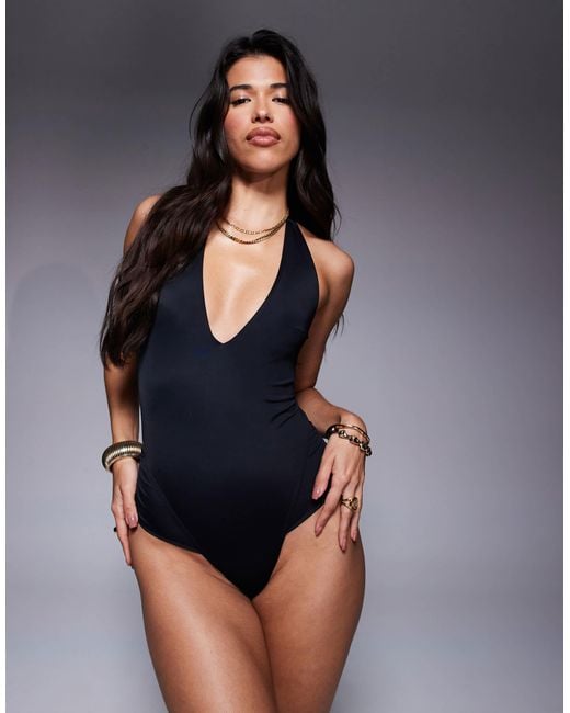 Maillot 1 pièce froncé et échancré à décolleté plongeant ASOS en coloris Black