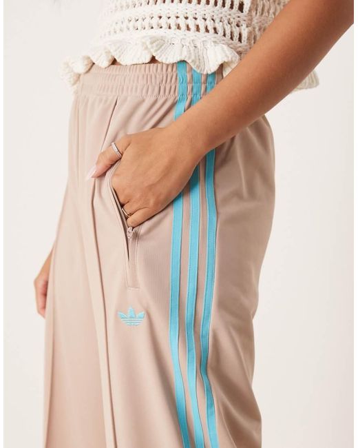 Pantalones De Chándal Beis Y Azules Firebird Loose De -Neutro Adidas Originals de color Natural