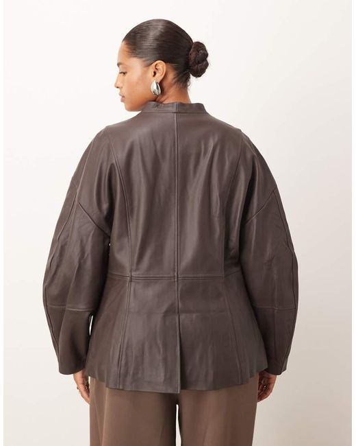 ARRANGE Brown Curve Soft Leather Jacket With Cinched Waist And Ovoid Sleeve