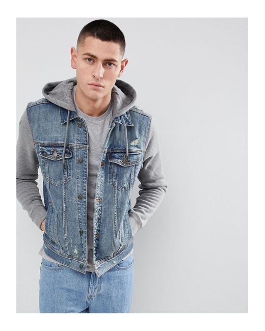Giacca di jeans con maniche felpate e cappuccio grigi lavaggio medio da  Uomo di Hollister in Blu | Lyst