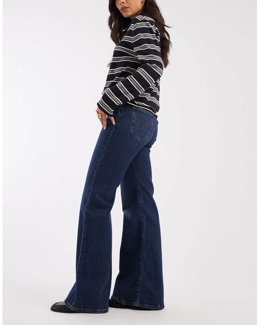 Ribcage bells - jean évasé à taille haute - moyen Levi's en coloris Blue