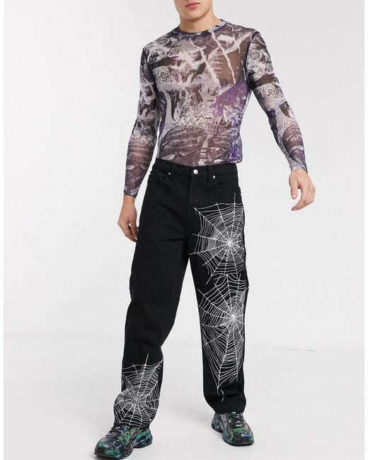Jaded London Jaded – Skater-Jeans mit Spinnwebendesign in Black für Herren