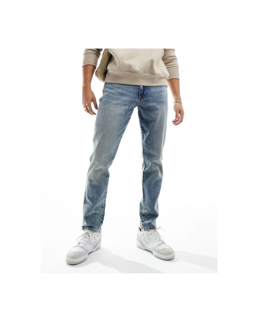 River Island Blue Tapered Jeans for men