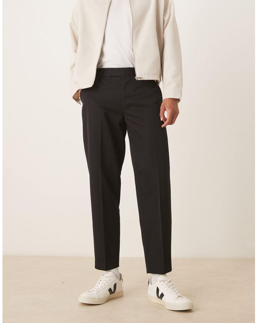 Pantalon habillé oversize fuselé ASOS pour homme en coloris Black