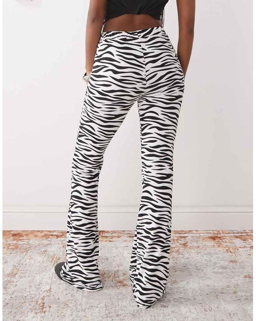 Noisy May Flare-Broek Van Jersey Met Zebraprint in het White