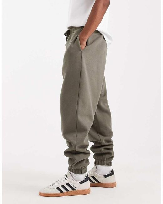 Joggers Caquis Holgados Básicos Essentials De -Verde ASOS de hombre de color Green