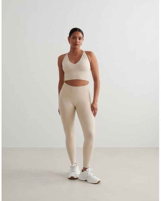 Brassière Modellante Senza Cuciture Incrociata Sul Retro di Aim'n in Brown