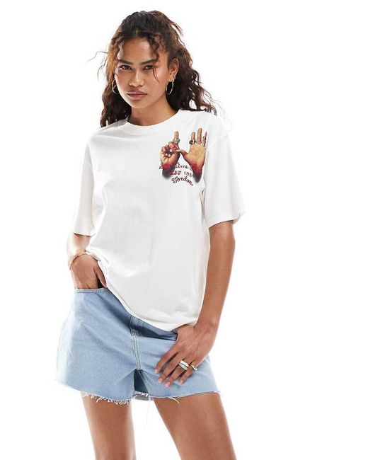 Camiseta Blanca Con Estampado Gráfico De Anillos En La Espalda De Nike de color White