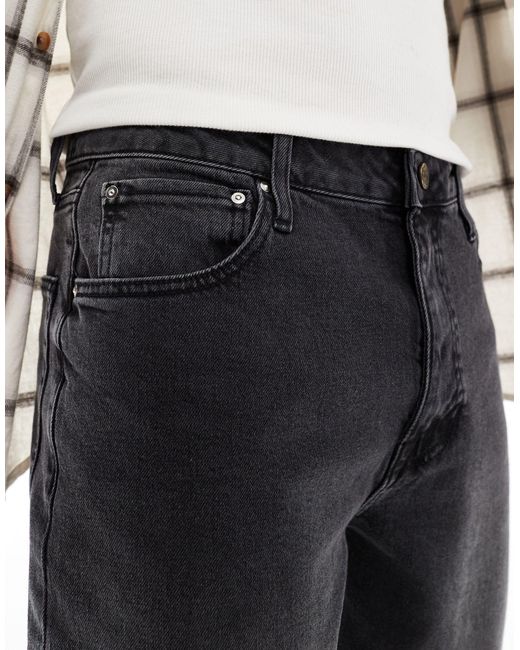 Jeans dritti elasticizzati slavato di ASOS in Black da Uomo