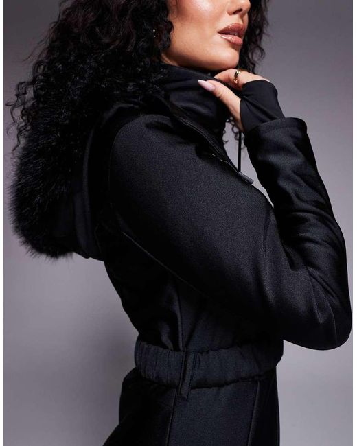 ASOS 4505 Ski & Snow Black Asos 4505 Hourglass Ski Soft Shell Belted Ski Suit With Slim Kick Leg And Faux Fur Hood