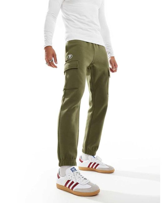 Aape By A Bathing Ape di Aape By A Bathing Ape in Green da Uomo