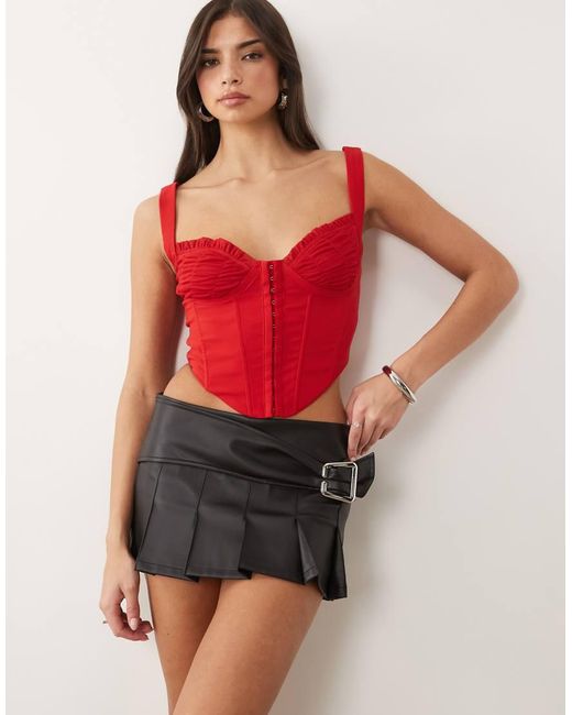 I.AM.GIA Black Desmina Leather Look Buckle Detail Pleated Mini Skirt
