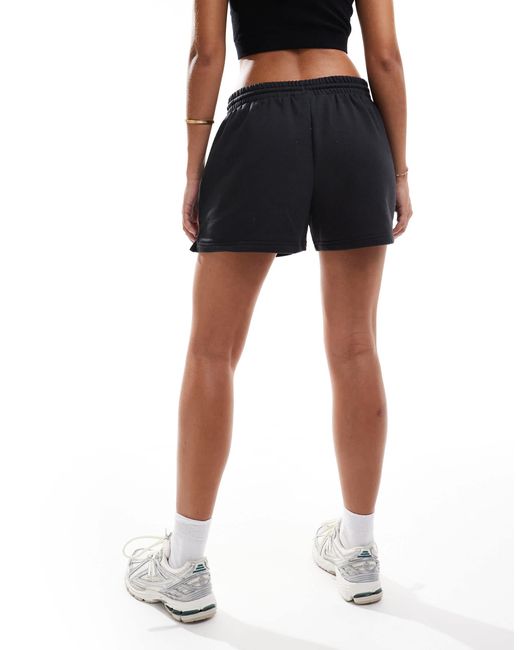 Sport essentials - short en tissu éponge New Balance en coloris Black