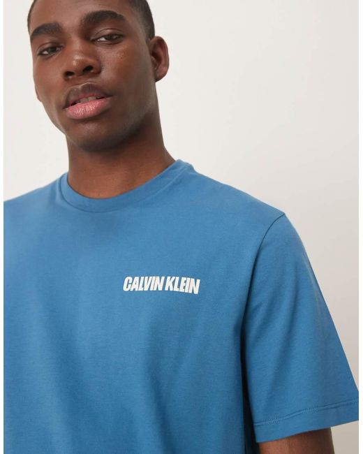 T-Shirt Con Stampa Verticale Sul Retro di Calvin Klein in Blue da Uomo