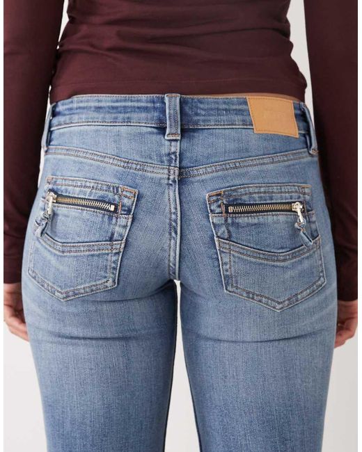Monki Blue Back Pocket Detail Flared Jeans