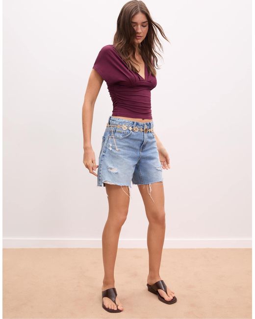 Top froncé à encolure en v Stradivarius en coloris Purple