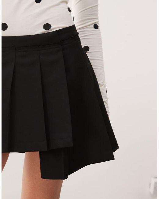 Monki Black Pleated Mini Skirt With Asymmetric Hem