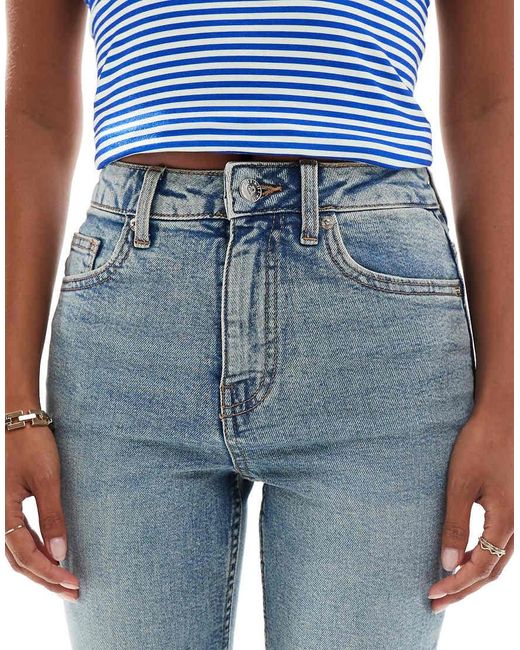 Vaqueros De Campana Con Lavado Deslucido Y Bolsillo En Forma De Corazón De -Azul Miss Selfridge de color Blue