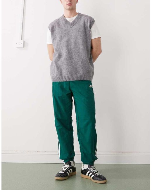 Adidas Originals Green Firebird Woven Track Pants for men