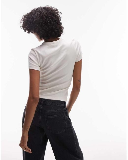 T-Shirt Slim Bianca A Coste Con Stemma Centrale di Tommy Hilfiger in White