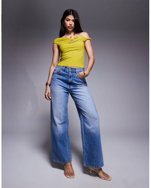 Top asymétrique avec bretelle torsadée - citron River Island en coloris Green