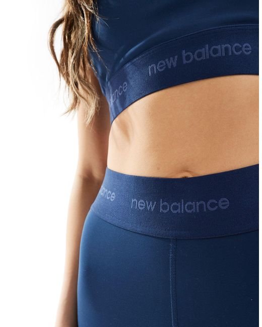 New Balance Blue Linear Logo Sleek 25 Inch High Rise leggings