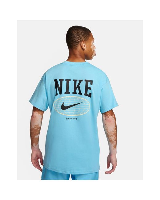 T-shirt à imprimé graphique et logo virgule au dos Nike pour homme en coloris Blue