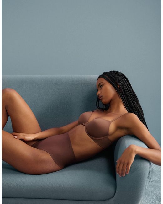Shapewear - string sculptant en tulle Calvin Klein en coloris Blue