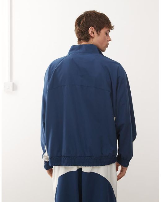 Collusion Blue Unisex Graphic Nylon Track Top