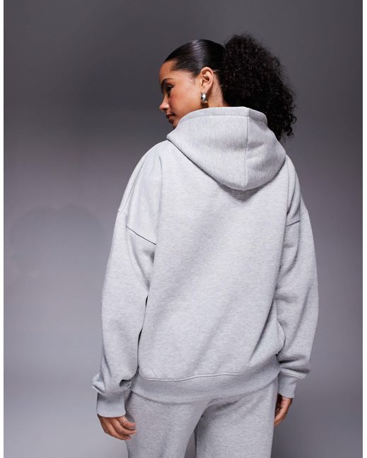Sweat à capuche d'ensemble oversize en coton majoritaire avec logo brodé - clair et rose Kaiia en coloris Gray