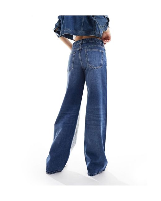 Jeans con fondo ampio e strass di Pull&Bear in Blue