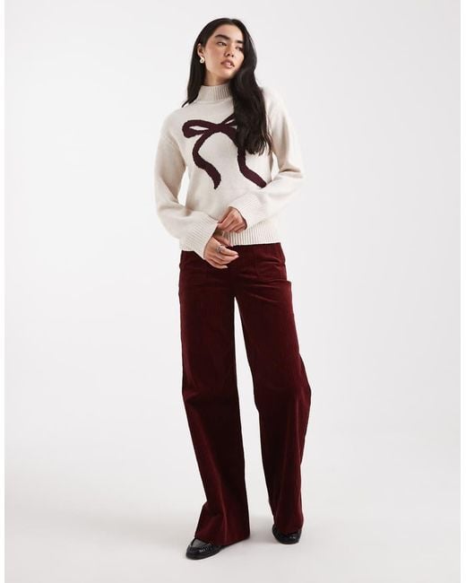 Brave Soul Natural Mock Neck Jumper With Bow Print