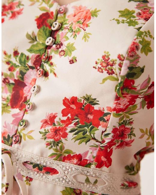 Blusa Blanca Con Estampado Floral Rojo, Escote Cuadrado, Sobrefalda Y Abertura En La Espalda De Hope & Ivy de color Red