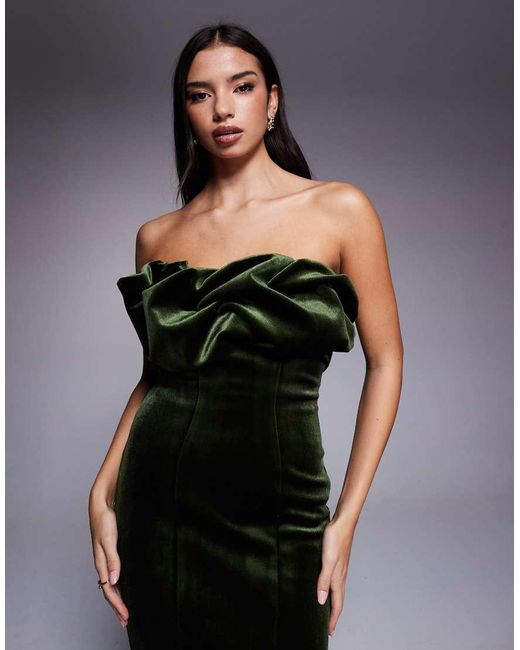 asos velvet dress green ASOS DESIGN one shoulder velvet drape corset detail midi dress in bottle  green
