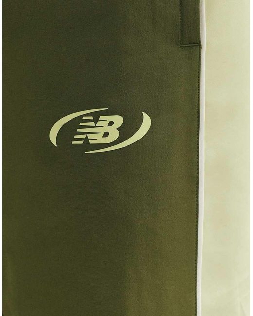 New Balance Green Trackside Woven Pant for men